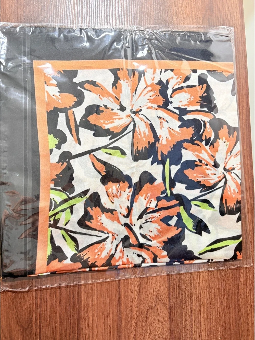 Elegant Floral Patterned Scarf with Black and Orange Border